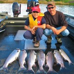 Father and son with Cowlitz River Coho Salmon