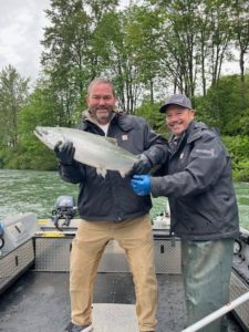 Happy fisherman with fishing guide Mike Sexton